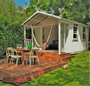 A Backyard Cabana is a worthwhile investment that can be used for multiple purposes. Image: Melwood Cabanas (deck and furniture added by client)