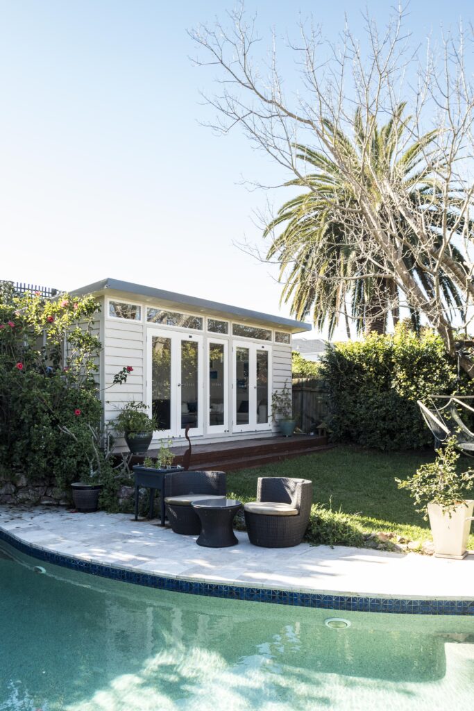 Studio in garden fronted by lawn